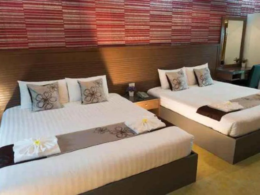 Bed in 111 Resort and Spa