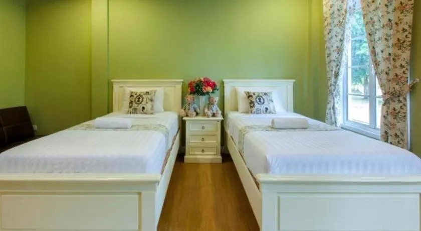 Bed in Varee Valley Resort and Restaurant