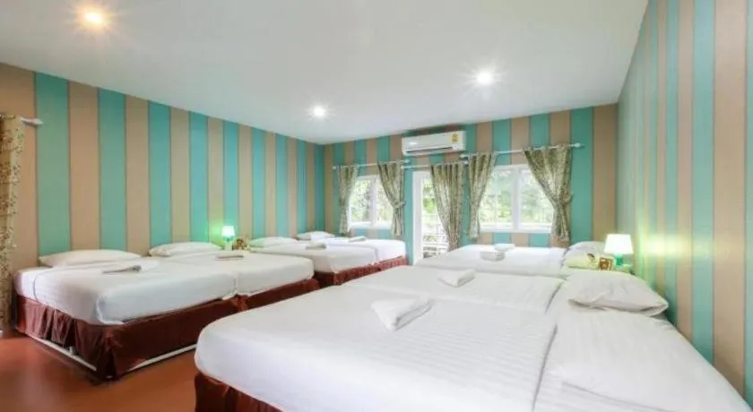 Bed in Varee Valley Resort and Restaurant