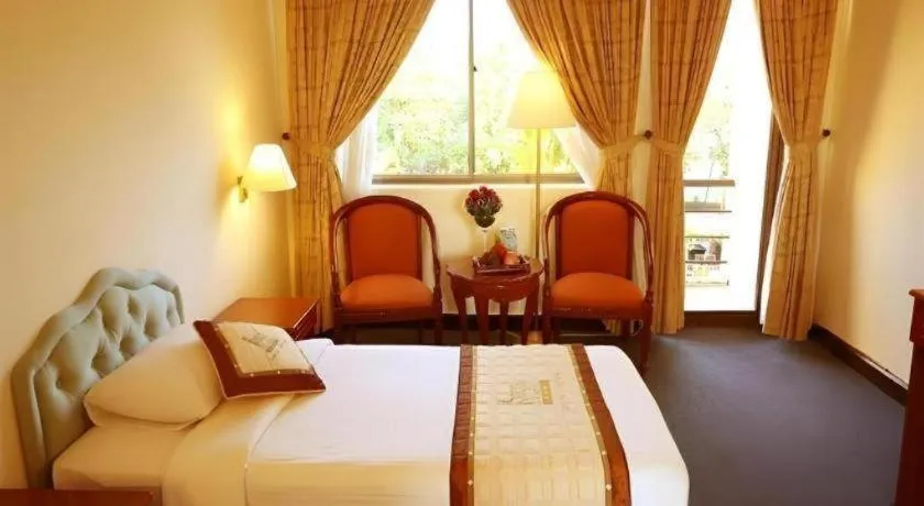 Bed in Royal Hotel