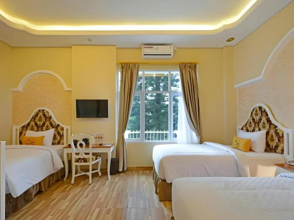 Bed in Sahira Hotel Pakuan