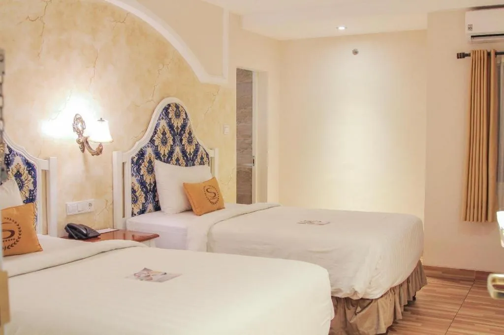 Bed in Sahira Hotel Pakuan