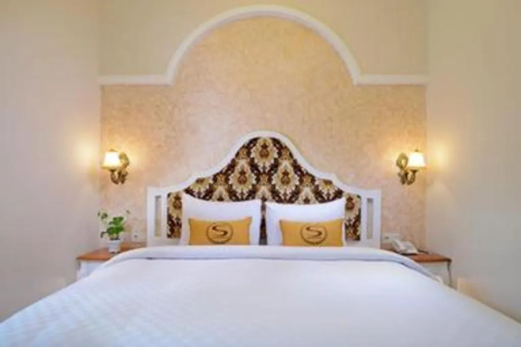 Bed in Sahira Hotel Pakuan