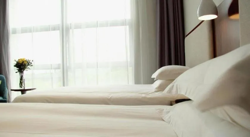 Bed in Hangzhou Berman Hotel