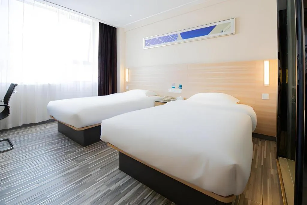 Bed in City Comfort Inn Changsha Tangshuili Fuyou