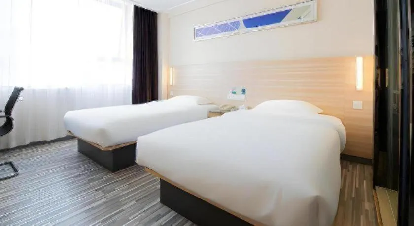 Bed in City Comfort Inn Changsha Tangshuili Fuyou