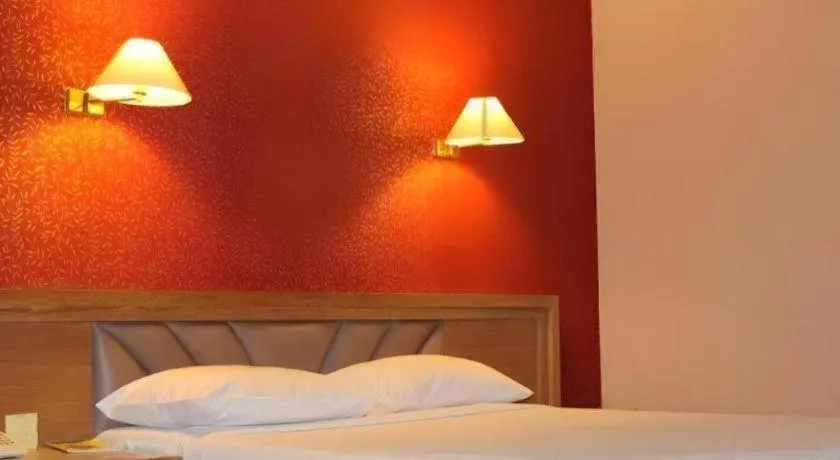 Bed in Wangtai Hotel