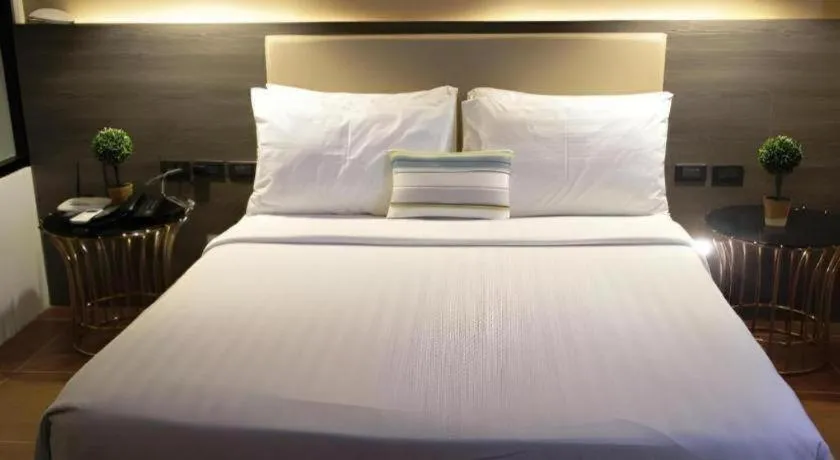 Bed in Home Crest Hotel