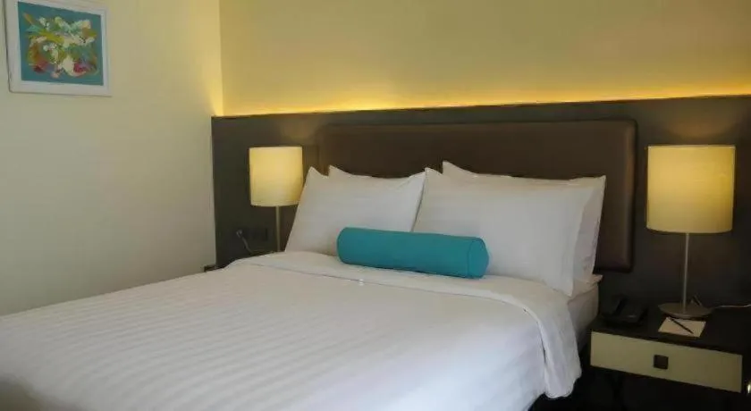 Bed in Home Crest Hotel