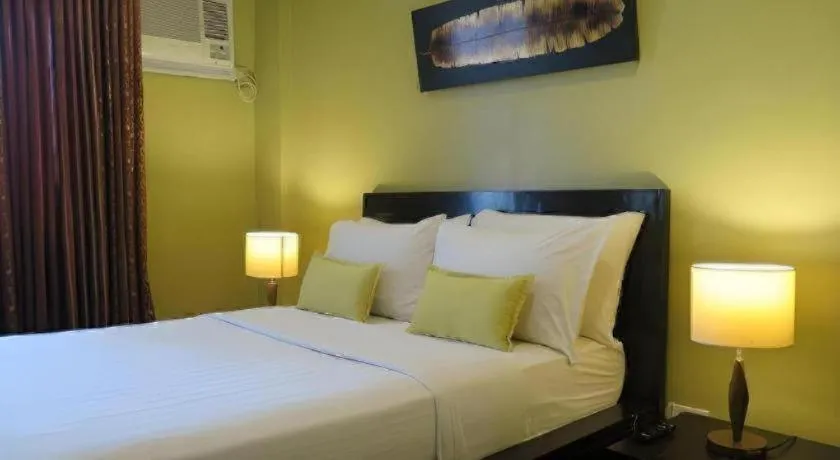 Bed in Home Crest Hotel