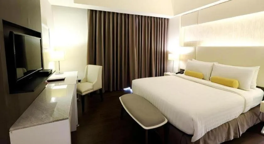 Bed in Home Crest Hotel