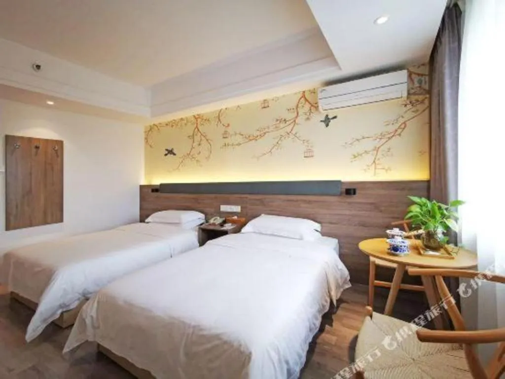 Bed in Anyi 158 Hotel Fuqin