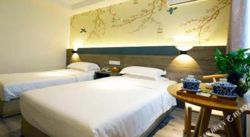 Bed in Anyi 158 Hotel Fuqin