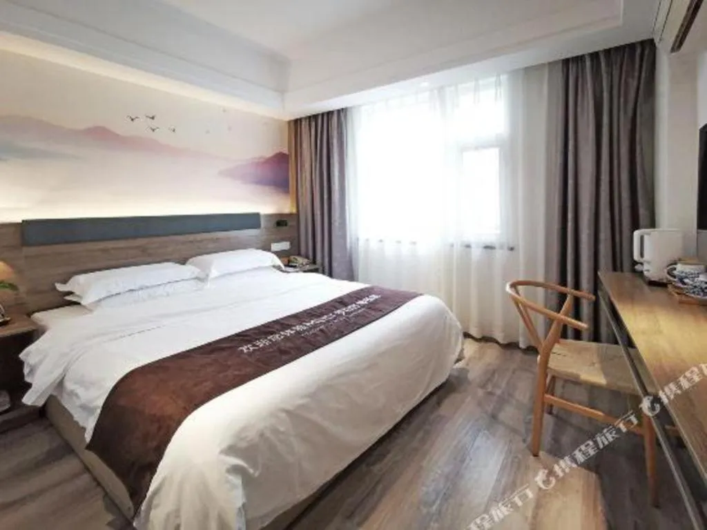 Bed in Anyi 158 Hotel Fuqin