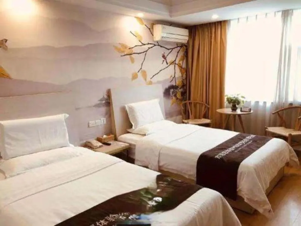 Bed in Anyi 158 Hotel Fuqin