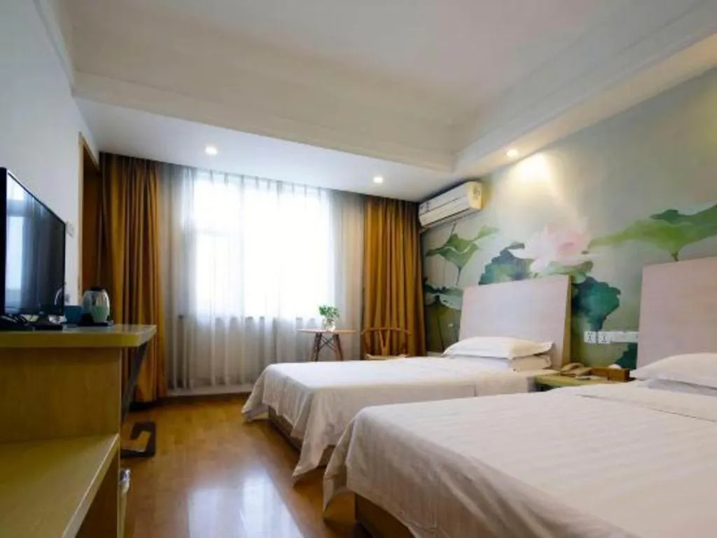 Bed in Anyi 158 Hotel Fuqin