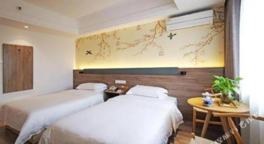 Bed in Anyi 158 Hotel Fuqin