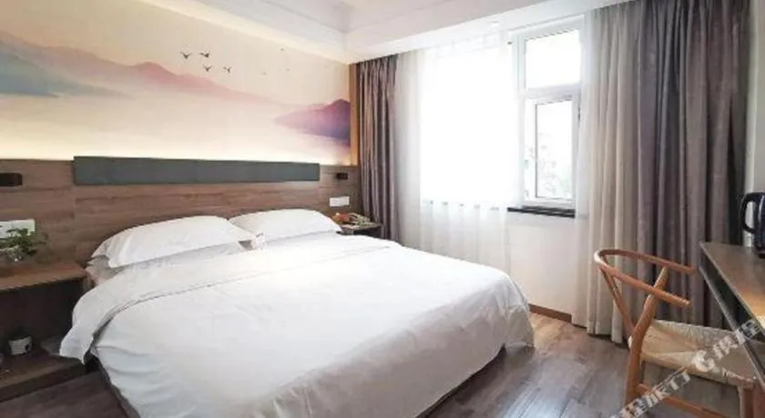 Bed in Anyi 158 Hotel Fuqin