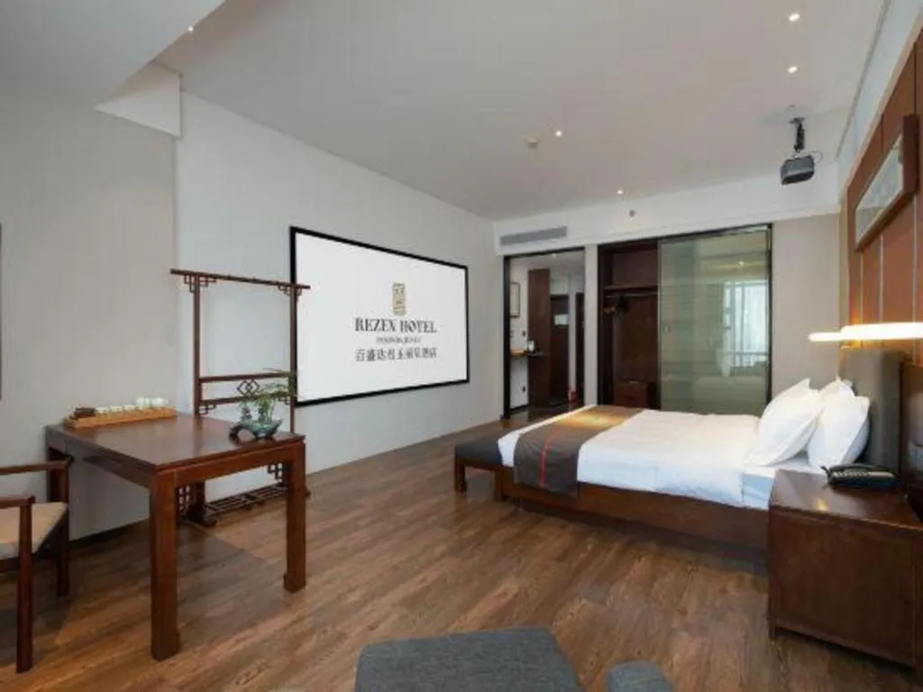 Bed in Rezen Hotel Pasonda Junyu