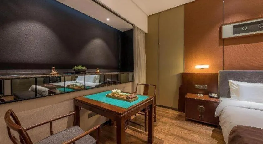 Bed in Rezen Hotel Pasonda Junyu