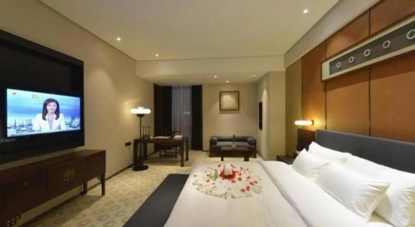 Bed in Rezen Hotel Pasonda Junyu