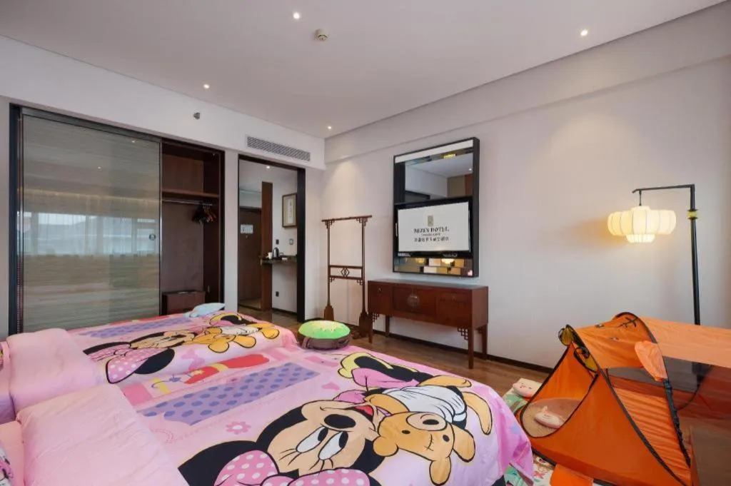 Bed in Rezen Hotel Pasonda Junyu