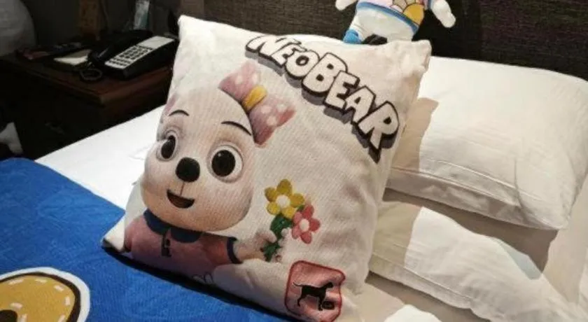 Bed in Rezen Hotel Pasonda Junyu