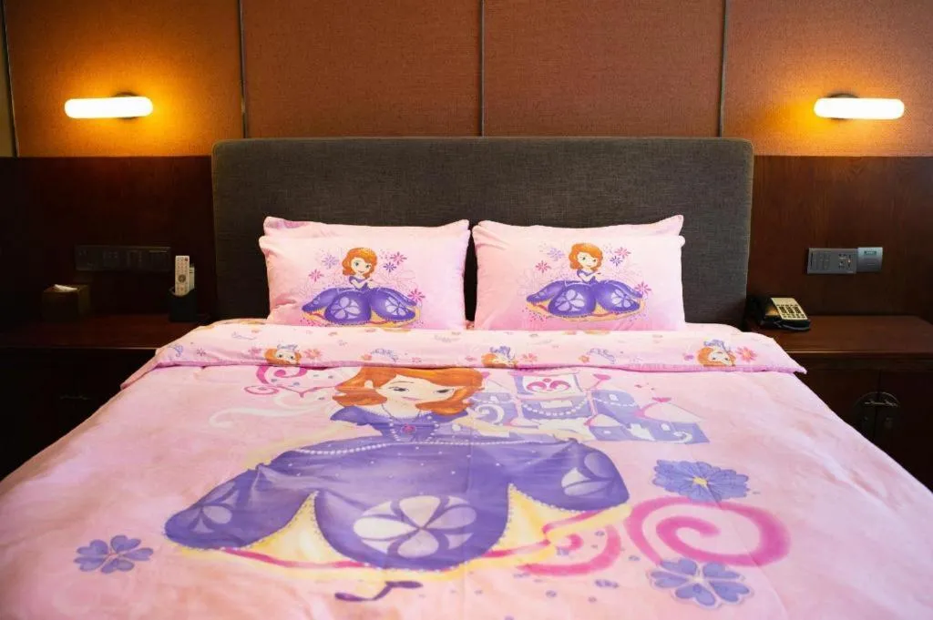 Bed in Rezen Hotel Pasonda Junyu