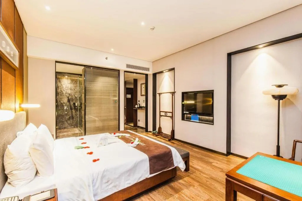 Bed in Rezen Hotel Pasonda Junyu