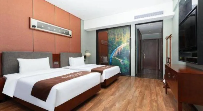 Bed in Rezen Hotel Pasonda Junyu