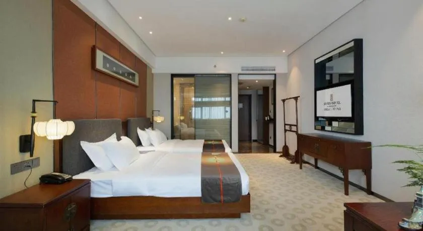 Bed in Rezen Hotel Pasonda Junyu