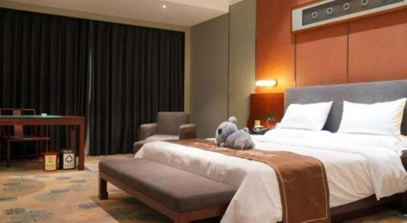 Bed in Rezen Hotel Pasonda Junyu