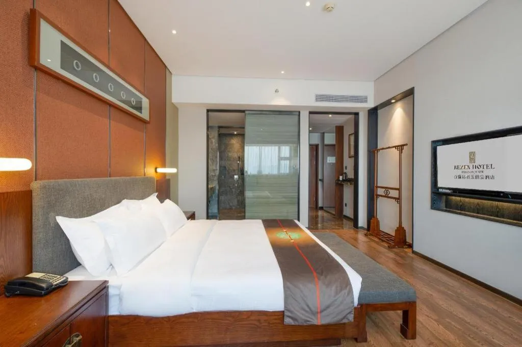 Bed in Rezen Hotel Pasonda Junyu