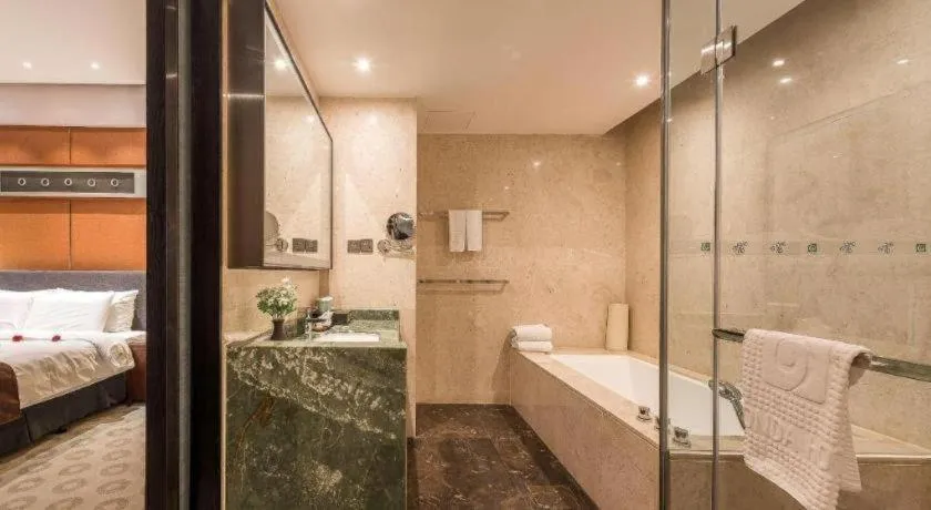 Bed in Rezen Hotel Pasonda Junyu