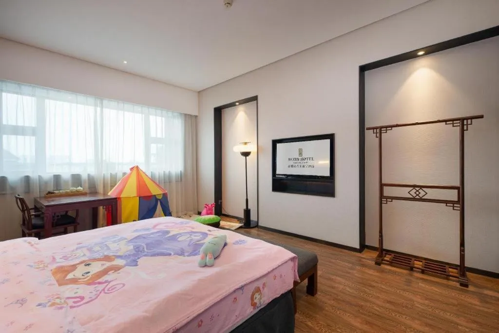 Bed in Rezen Hotel Pasonda Junyu