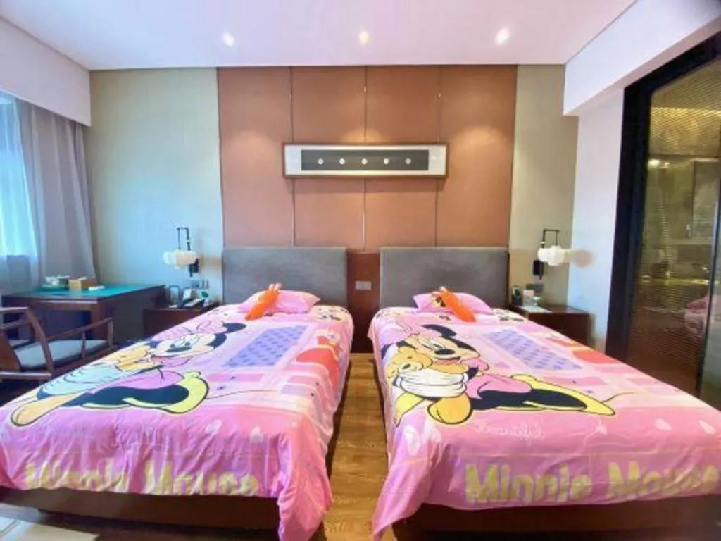 Bed in Rezen Hotel Pasonda Junyu