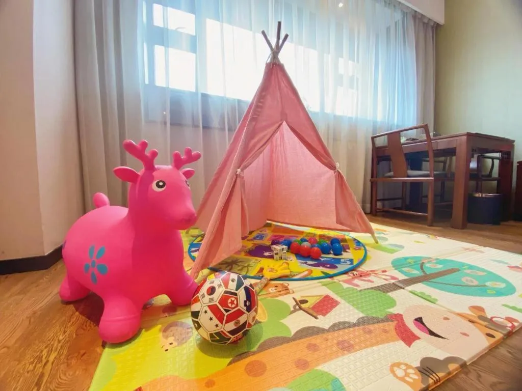 Bed in Rezen Hotel Pasonda Junyu