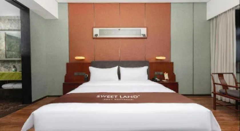 Bed in Rezen Hotel Pasonda Junyu