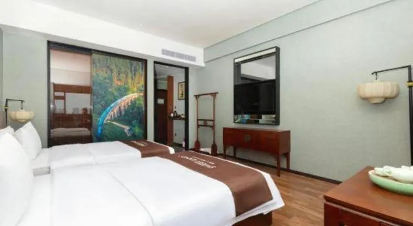 Bed in Rezen Hotel Pasonda Junyu