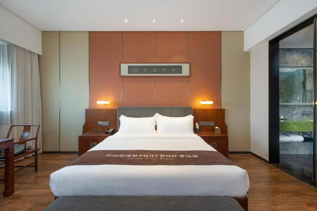 Bed in Rezen Hotel Pasonda Junyu