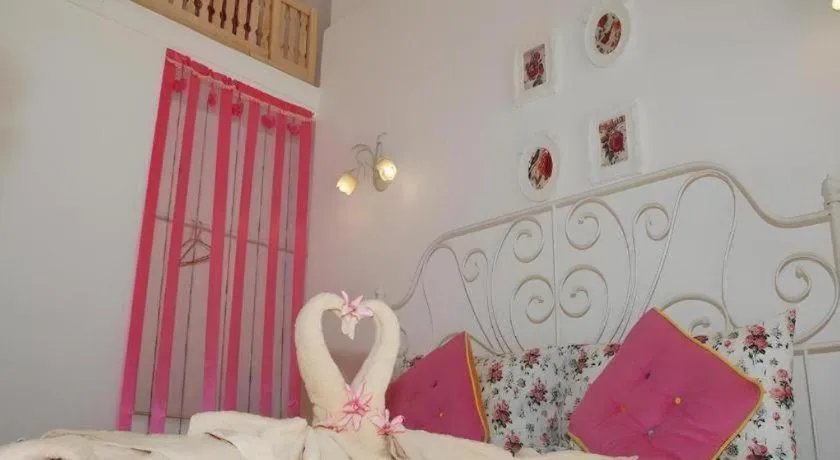 Bed in Rak Na Suan Pueng Resort