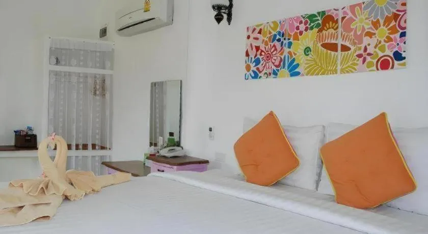 Bed in Rak Na Suan Pueng Resort