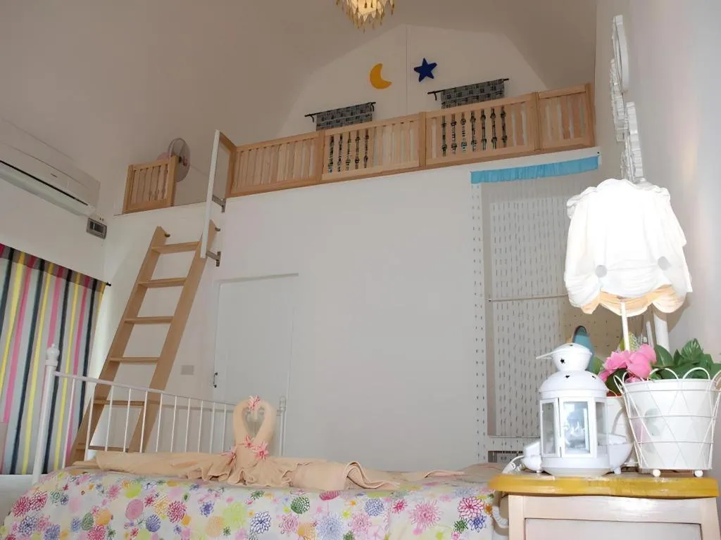 Bed in Rak Na Suan Pueng Resort