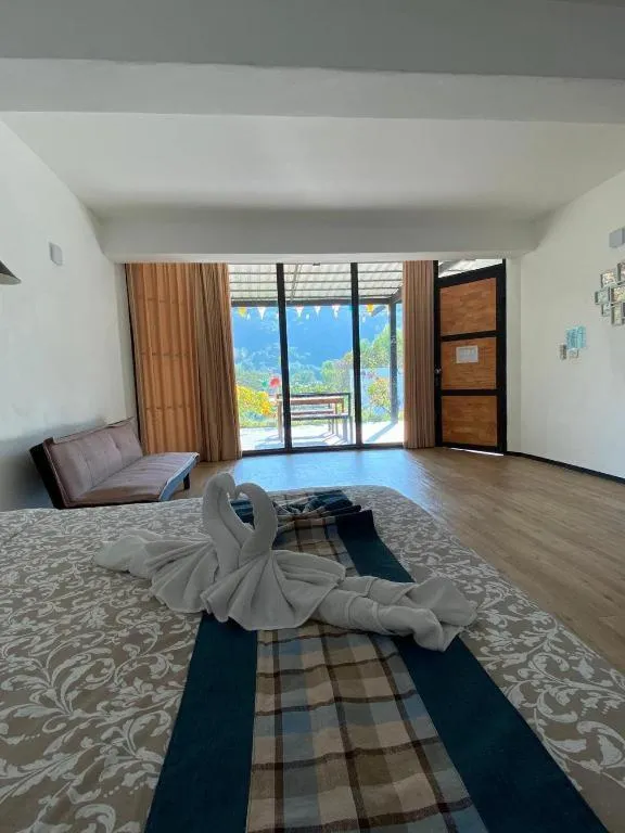 Bed in Rak Na Suan Pueng Resort