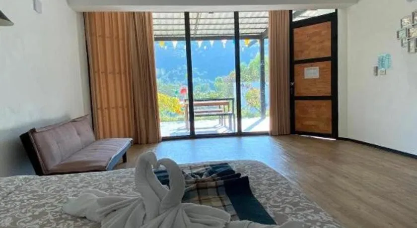 Bed in Rak Na Suan Pueng Resort