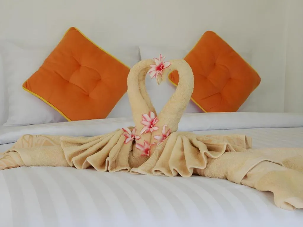 Bed in Rak Na Suan Pueng Resort