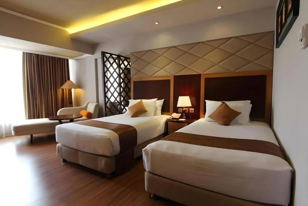Bed in Regent's Park Hotel at Kayutangan Malang