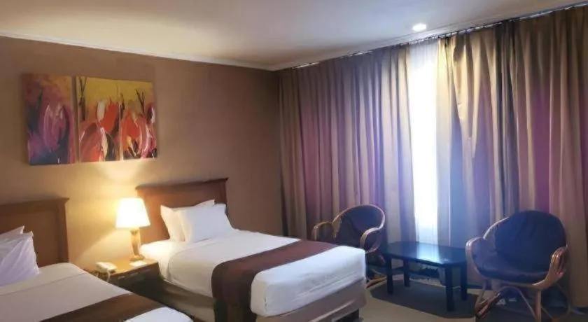 Bed in Regent's Park Hotel at Kayutangan Malang