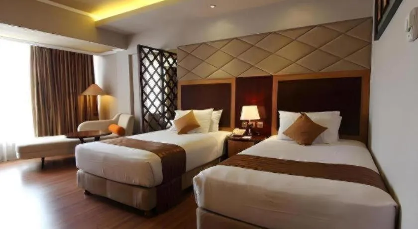 Bed in Regent's Park Hotel at Kayutangan Malang