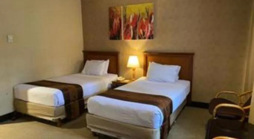 Bed in Regent's Park Hotel at Kayutangan Malang